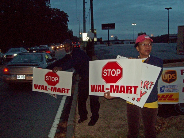 Photo of Grace Campbell, a protester with Good Growth DeKalb, opposing Walmart expanding into Suburban Plaza in Decatur.