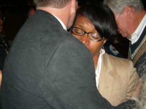 Lisa Cupid gets a hug from one of her supporters after the vote