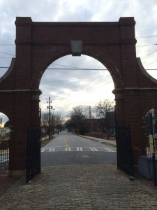 Seen through a gateway of Oakland Cemetery, the eastern terminus of Martin Luther King Jr. Drive is a collection of low-density structures. Credit: David Pendered