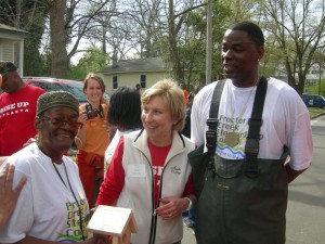 Resident Juanita Wallace, Blank Foundation's Penny McPhee and activist Tony Torrence talk during the Volunteer Day