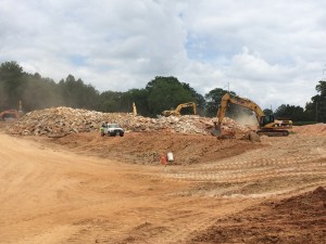 Earthmovers are raising the site of the Chastain mixed use project, which will serve as a landmark entrance to Sandy Springs on Roswell Road. Credit: David Pendered 
