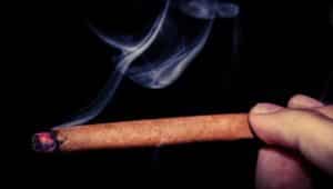 Some pot smokers replace the tobacco of little cigars with marijuana. They may not realize the cancer risks associated with the cigar wrapper, according to a new report. Credit: rebloggy.com