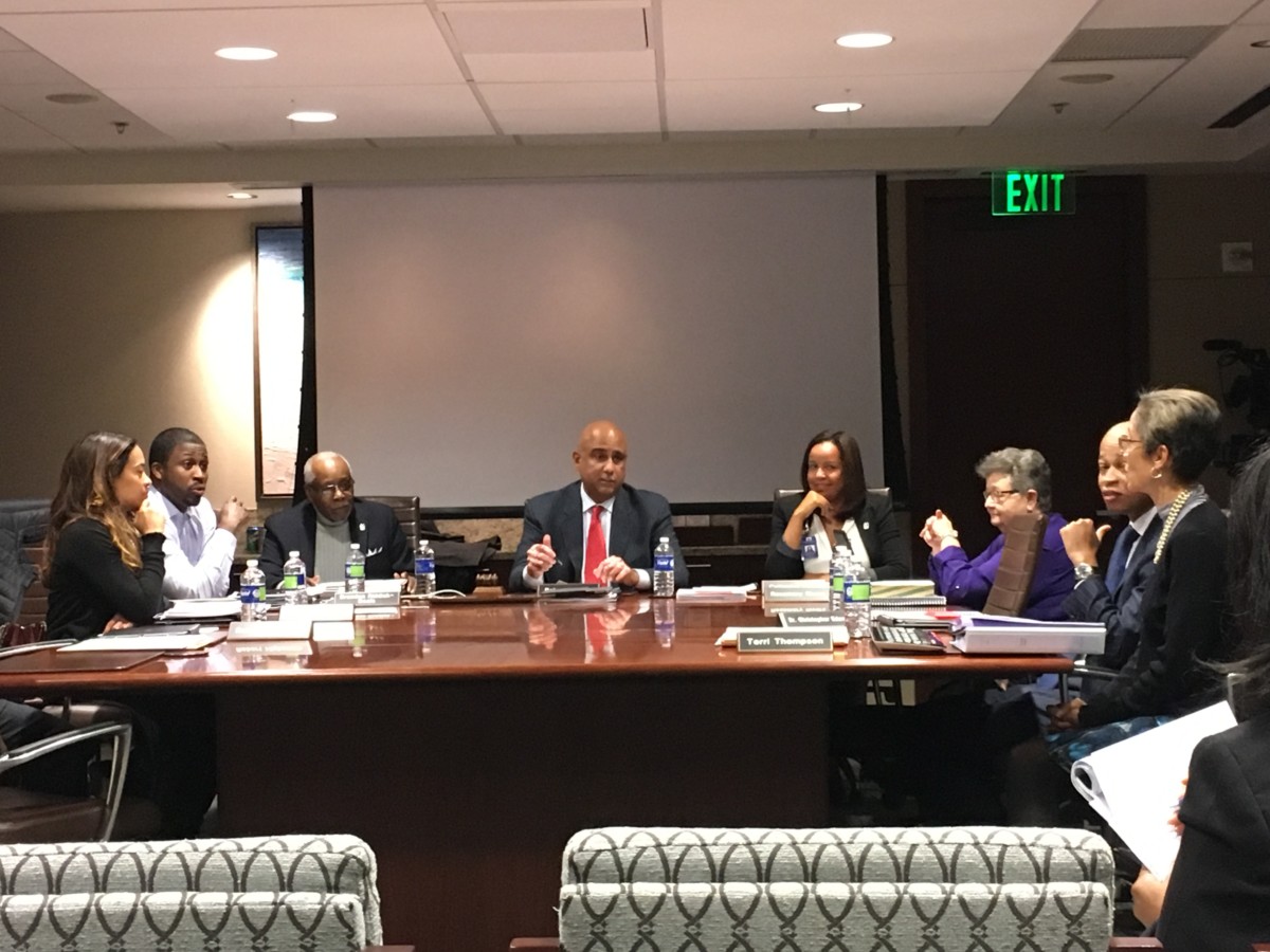 Dr. Christopher Edwards, center, at a meeting with his fellow members of the Atlanta Housing Authority Board of Commissioners, which voted him their chair on Wednesday. Credit: Maggie Lee