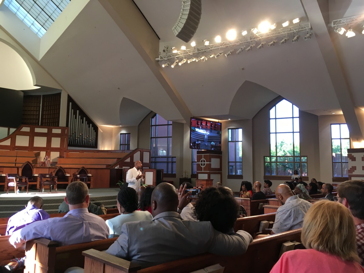Rev. Raphael Warnock addressed more than 100 people Wednesday night. Credit: Maggie Lee