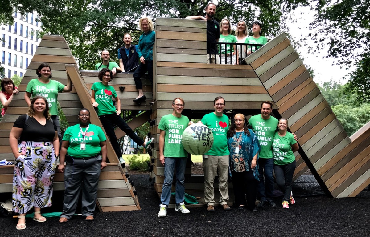 Folks from the Trust for Public Land, Park Pride and the Atlanta Downtown Improvement District showed up at Woodruff park on foot on Wednesday as part of a park access campaign. Credit: Kelly Jordan