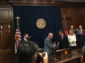 On Thursday, Gov. Nathan Deal welcomed Brian Kemp into the Capitol, saying the transition to the next Republican governor had begun. But Democrat Stacey Abrams has not conceded. Credit: Maggie Lee
