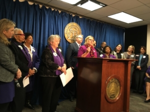 State Sens. Renee Unterman (at podium) and Nan Orrock (fourth from left), a Republican and a Democrat, who have both filed ERA legislation, spoke about their efforts at a state Capitol press conference on Wednesday. Credit: Maggie Lee