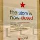 Sign in South DeKalb Macy's window reading "the store is now closed..."