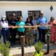 Family of namesake Claudia Kemp cut the ribbon on Claudia's House July 14, 2020 with Fulton County Commissioner Natalie Hall. L-R: Cynthia Hines, Commissioner Natalie Hall, Anthony Gates, Mariah Hines, Larenzia Lawrence, Nick Woods, Marvin Hines, Shon Hines and LaTonya Gates. Credit: Special