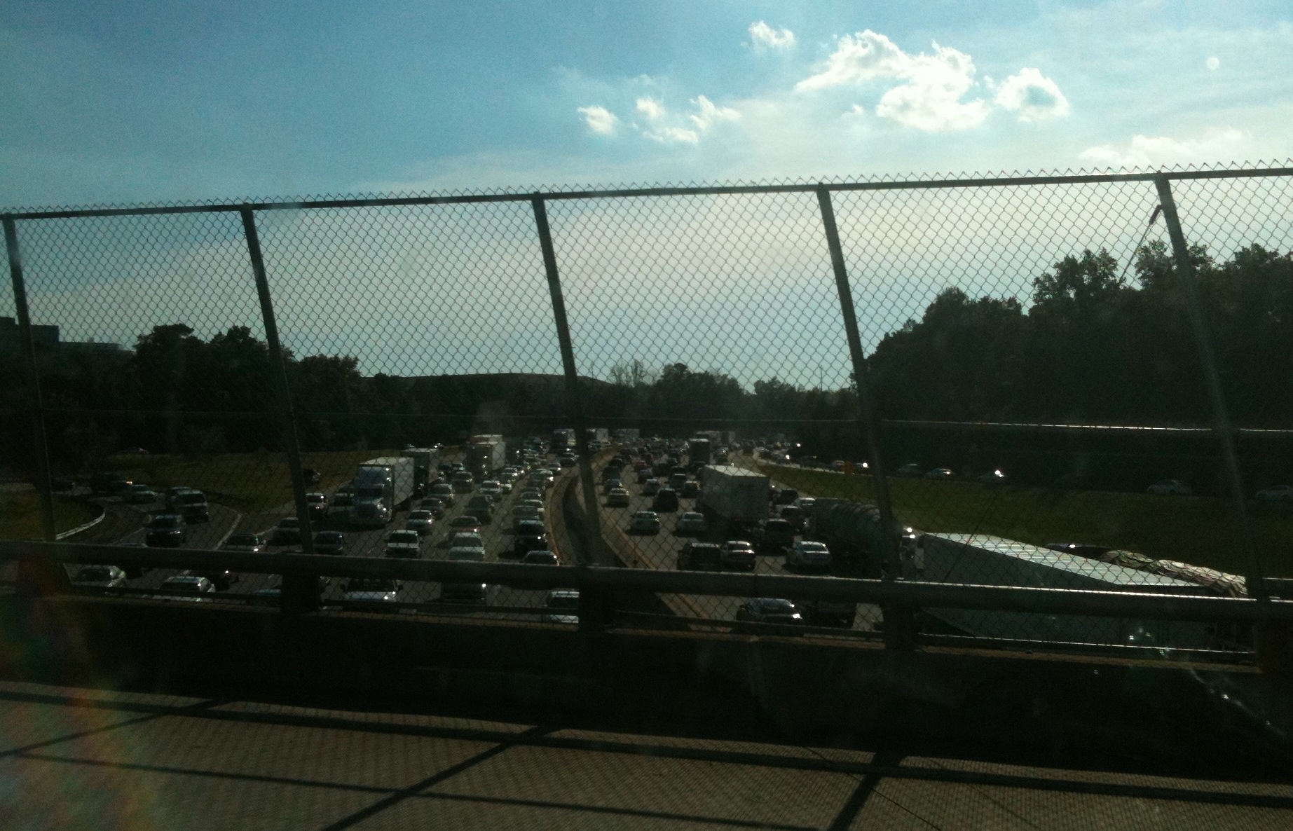 Afternoon rush-hou traffic backs up on I-285 beneath the Ga. 400 overpass. Credit: David Pendered